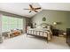 Spacious main bedroom with a vaulted ceiling, large windows, and tasteful decor at 18278 Benton Oak Dr, Noblesville, IN 46062