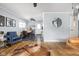Open-concept living area with dining space featuring a modern table, chairs, and stylish decor at 2110 Allison Ave, Speedway, IN 46224