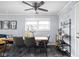 Cozy dining area with a wood table, modern chairs, and stylish decor in a well-lit space at 2110 Allison Ave, Speedway, IN 46224