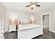 Comfortable bedroom with a bed, matching nightstands and lamps with elegant decor at 217 N Liberty Blvd, Mooresville, IN 46158