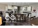 Spacious kitchen with a large center island, modern appliances, and stylish cabinetry at 217 N Liberty Blvd, Mooresville, IN 46158
