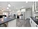 Stylish kitchen featuring a center island, stainless steel appliances, and ample counter space at 217 N Liberty Blvd, Mooresville, IN 46158