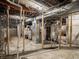 Unfinished basement view with concrete floor, utilities and supports at 2528 S Pennsylvania St, Indianapolis, IN 46225
