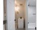 Bathroom featuring modern fixtures, including a sink and walk-in shower with neutral tile at 2528 S Pennsylvania St, Indianapolis, IN 46225