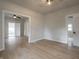 This bedroom features new floors, neutral paint, decorative doors, and modern lighting at 2528 S Pennsylvania St, Indianapolis, IN 46225