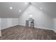 Spacious bonus room featuring neutral walls and wood-look laminate flooring at 2528 S Pennsylvania St, Indianapolis, IN 46225