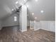 Spacious bonus room featuring neutral walls and wood-look laminate flooring at 2528 S Pennsylvania St, Indianapolis, IN 46225