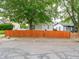 Charming home with a well maintained orange fence at 2528 S Pennsylvania St, Indianapolis, IN 46225