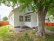 Charming home exterior features new white siding and well-maintained landscaping at 2528 S Pennsylvania St, Indianapolis, IN 46225