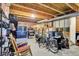 Unfinished basement features exposed ceiling and stored items, offering potential for customization at 2623 Senators Way, Indianapolis, IN 46217