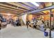 Unfinished basement offers potential for customization, featuring exposed ceiling and concrete floor at 2623 Senators Way, Indianapolis, IN 46217
