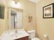 Cozy bathroom with a wood vanity, a mirror, and essential fixtures at 2623 Senators Way, Indianapolis, IN 46217