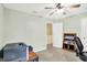 Bedroom with neutral paint, neutral carpet, and access to hallway and closet at 2623 Senators Way, Indianapolis, IN 46217