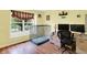 Bright room with hardwood floors and lots of natural light from a large window at 2623 Senators Way, Indianapolis, IN 46217