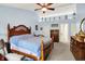 Large main bedroom with a vaulted ceiling, ceiling fan, and access to the en-suite bathroom at 2623 Senators Way, Indianapolis, IN 46217