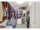 Walk-in closet offers ample storage with shelving and hanging racks, ready for organization at 2623 Senators Way, Indianapolis, IN 46217