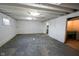Spacious unfinished basement featuring concrete walls and floors with potential for storage and customization at 2721 W 34Th St, Anderson, IN 46011