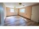 An inviting bedroom with ample natural light, wood-look flooring, and a clean, neutral color palette at 2721 W 34Th St, Anderson, IN 46011