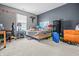 Bedroom with gray walls, light carpet, and a bed near the window at 2730 Foxbriar Pl, Indianapolis, IN 46203