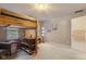 View of bedroom with built-in desk and shelving, flooded with natural light from the large window at 2953 Foxborough Dr, Greenwood, IN 46143