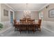 Formal dining room with chandelier and natural light at 2953 Foxborough Dr, Greenwood, IN 46143