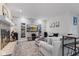 Inviting living room with a brick fireplace, custom shelving, and a large sectional sofa at 2953 Foxborough Dr, Greenwood, IN 46143