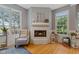 Living room features a fireplace and natural light at 2953 Foxborough Dr, Greenwood, IN 46143