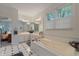 Spacious main bathroom featuring a jacuzzi bathtub, double sinks, and plenty of natural light at 2953 Foxborough Dr, Greenwood, IN 46143
