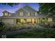 Stunning home with inviting front porch, landscaped yard, and attached garage at 2971 N Buck Creek Rd, Greenfield, IN 46140
