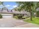 Charming two-story home with a landscaped front yard and attached garage at 2971 N Buck Creek Rd, Greenfield, IN 46140