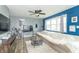 Cozy living room with hardwood floors, neutral walls, and large windows at 305 W Vinyard St, Anderson, IN 46011