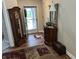 Elegant foyer with hardwood floors, a grandfather clock, and decorative accents at 308 Bay Ridge Dr, Pendleton, IN 46064