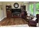 Comfortable living room with dark wood accents, stylish furnishings, and ample seating at 308 Bay Ridge Dr, Pendleton, IN 46064