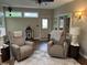 Bright living room featuring comfortable seating, a jukebox, and plenty of natural light at 308 Bay Ridge Dr, Pendleton, IN 46064