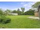 Sprawling backyard with lush greenery, offering plenty of space at 3526 Westfield Dr, Anderson, IN 46011