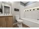 Well-lit bathroom with modern fixtures, bathtub, and stylish decor at 3526 Westfield Dr, Anderson, IN 46011