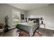 Stylishly decorated bedroom with a plush bed, modern decor, and natural light from the window at 3526 Westfield Dr, Anderson, IN 46011