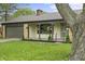 Charming brick home with an attached garage and inviting covered front porch at 3526 Westfield Dr, Anderson, IN 46011