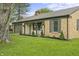 Charming brick home with an attached garage and inviting covered front porch at 3526 Westfield Dr, Anderson, IN 46011