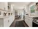 Well-lit kitchen with a modern dining set, sleek countertops, and ample cabinet space at 3526 Westfield Dr, Anderson, IN 46011