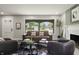 Bright living room featuring a large window offering a view of the front exterior at 3526 Westfield Dr, Anderson, IN 46011