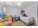 Comfortable ' bedroom with beds, a shared desk, and cheerful decor at 3638 Fieldstone Ln, Plainfield, IN 46168