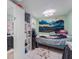 Charming bedroom with a single bed, wardrobe, and unique mountain tapestry at 3638 Fieldstone Ln, Plainfield, IN 46168