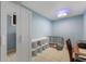 Bedroom with closet, shelving unit, neutral walls, and lots of natural light at 3638 Fieldstone Ln, Plainfield, IN 46168