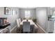 Elegant dining room featuring a modern table, comfortable seating, and stylish decor at 3638 Fieldstone Ln, Plainfield, IN 46168