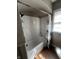 This bathroom features a white tile shower, modern fixtures, and a shower curtain at 3752 N Oxford St, Indianapolis, IN 46218