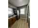 Functional kitchen equipped with wood cabinets, stainless steel appliances, and double sink at 3752 N Oxford St, Indianapolis, IN 46218