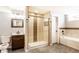 Updated bathroom featuring a walk-in shower and modern fixtures at 4435 E 38Th St, Indianapolis, IN 46218