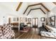 Open living area with beamed ceilings, wood floors, and stylish furnishings for a welcoming atmosphere at 4435 E 38Th St, Indianapolis, IN 46218