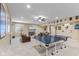 Spacious finished basement offering a ping pong table and comfortable seating area for entertaining at 4681 Shelby Cir, Greenwood, IN 46143